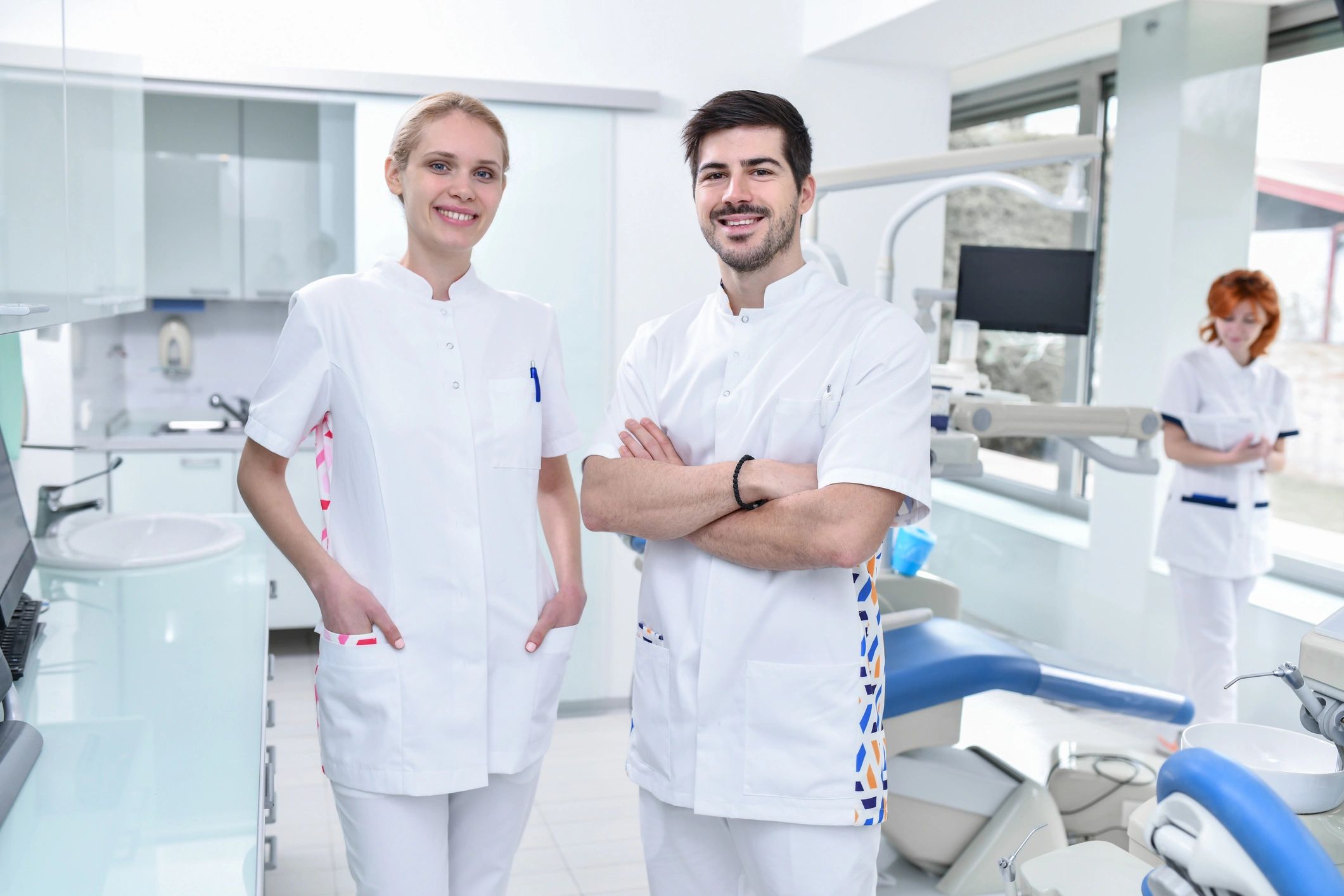 Smiling dental team in a bright clinic