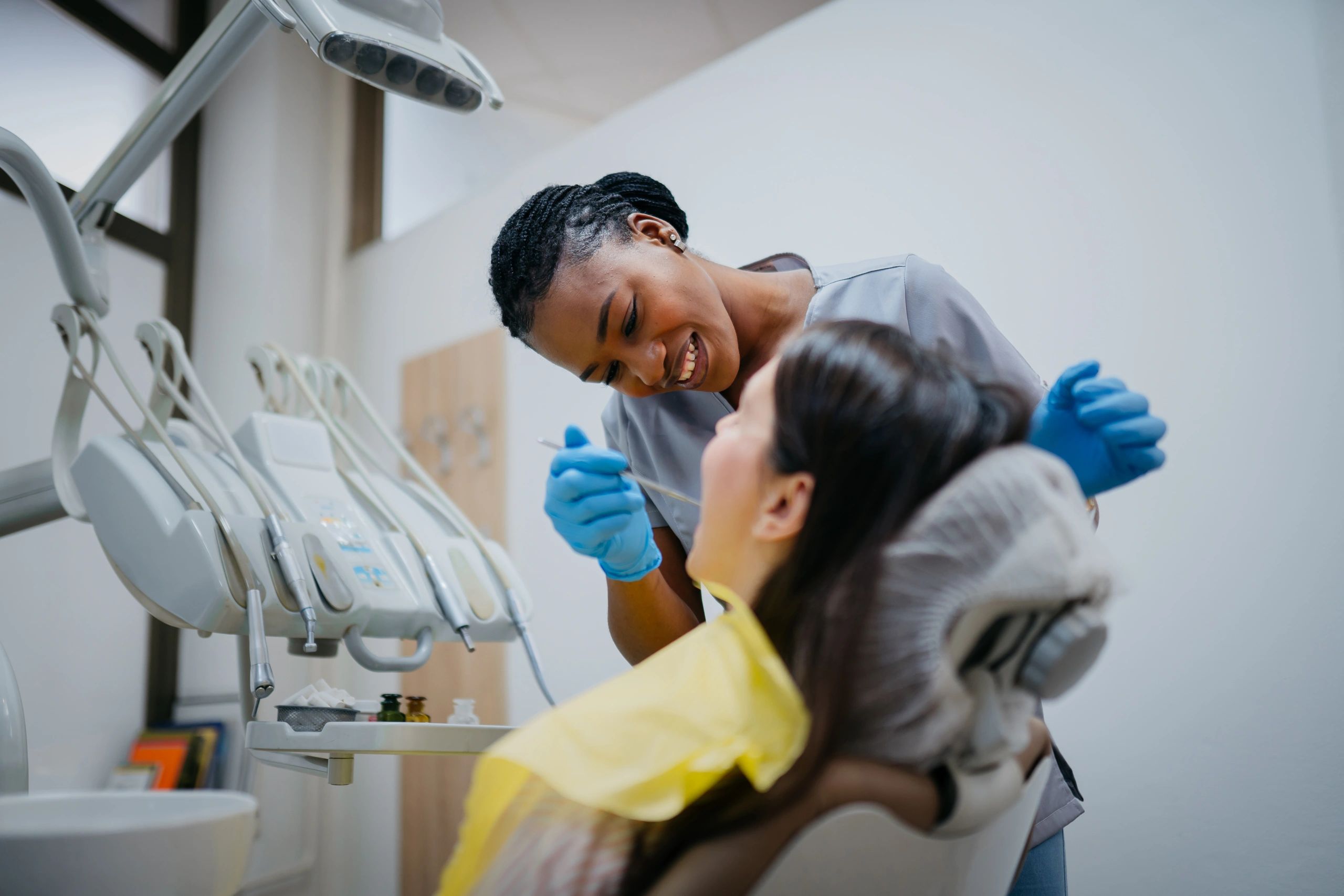 Dentist examining a patient during a checkup